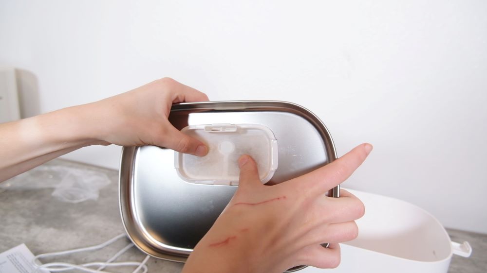 Putting the primary filter on the water fountain