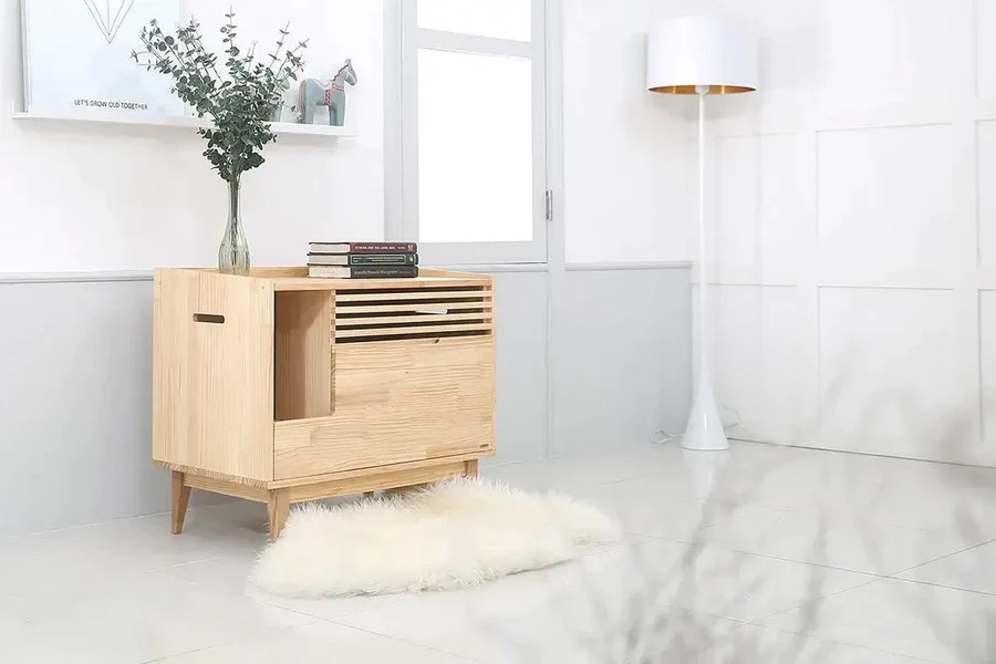 Stylish wooden litter box enclosure from Tuft + Paw.